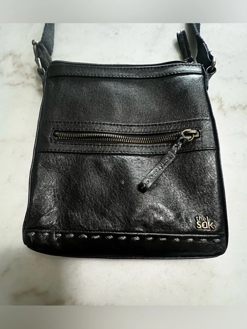 The Sak Black Leather Crossbody Bag with Gold Hardware And Colorful Lining